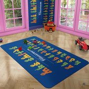 Close up texture detail showing soft pile surface and stitching of classroom area rug. - thumbnail image 3 of 9