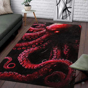 Dark crimson kraken octopus living room area rug emerging from black abyss with glowing eye - thumbnail image 1 of 7