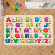 Educational play mat area rug displaying a full alphabet chart with colorful 3D letters on a light beige backdrop. - thumbnail image 1 of 8