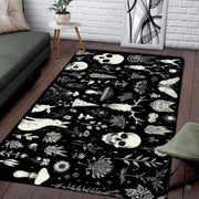 Sunlit living space mockup showcasing the black and white skull rug laid flat between furniture - thumbnail image 7 of 8