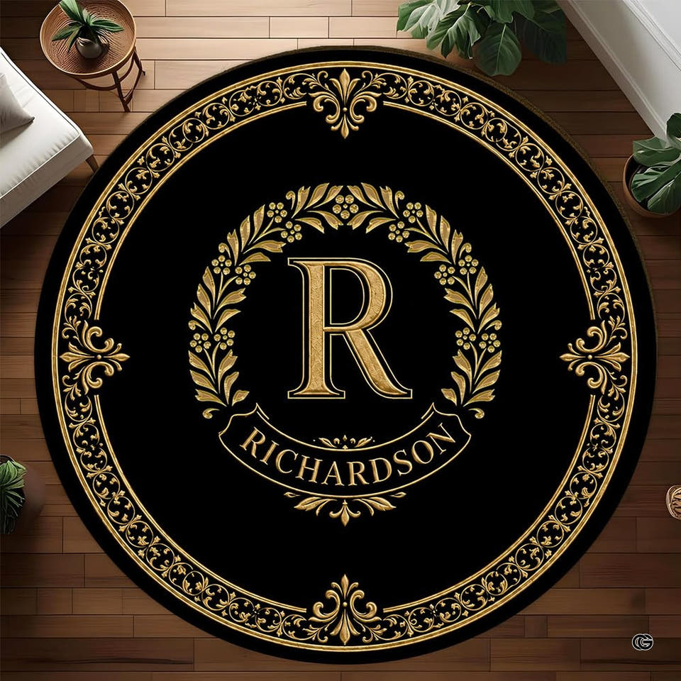 Baroque crest round floor rug showcasing ornate golden laurel medallion and concentric borders on dark background.