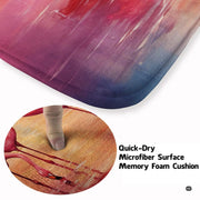 Angled view of serene area rug highlighting rich coral, gold, and purple sunset tones on reflective waters. - thumbnail image 6 of 7