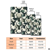 Diamond pattern area rug visual detail showing forest green and olive deer head motif on an off-white background. - thumbnail image 2 of 7