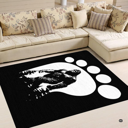 Cozy living room corner with patterned cushions showcasing sasquatch footprint pine forest area rug - thumbnail image 4 of 5