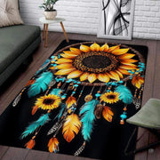 Sunflower floor rug featuring a bohemian dreamcatcher with turquoise feathers on a dark backdrop. - thumbnail image 1 of 7