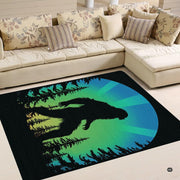 Retro Bigfoot silhouette home area rug styled beneath a modern living room coffee table setup. - thumbnail image 4 of 5