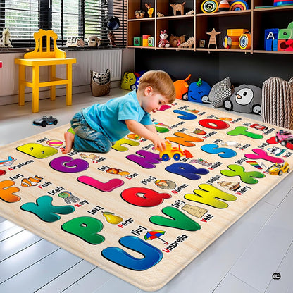 Close-up view of vibrant 3D letters and charming illustrated companion graphics on this alphabet theme floor rug. - thumbnail image 3 of 8