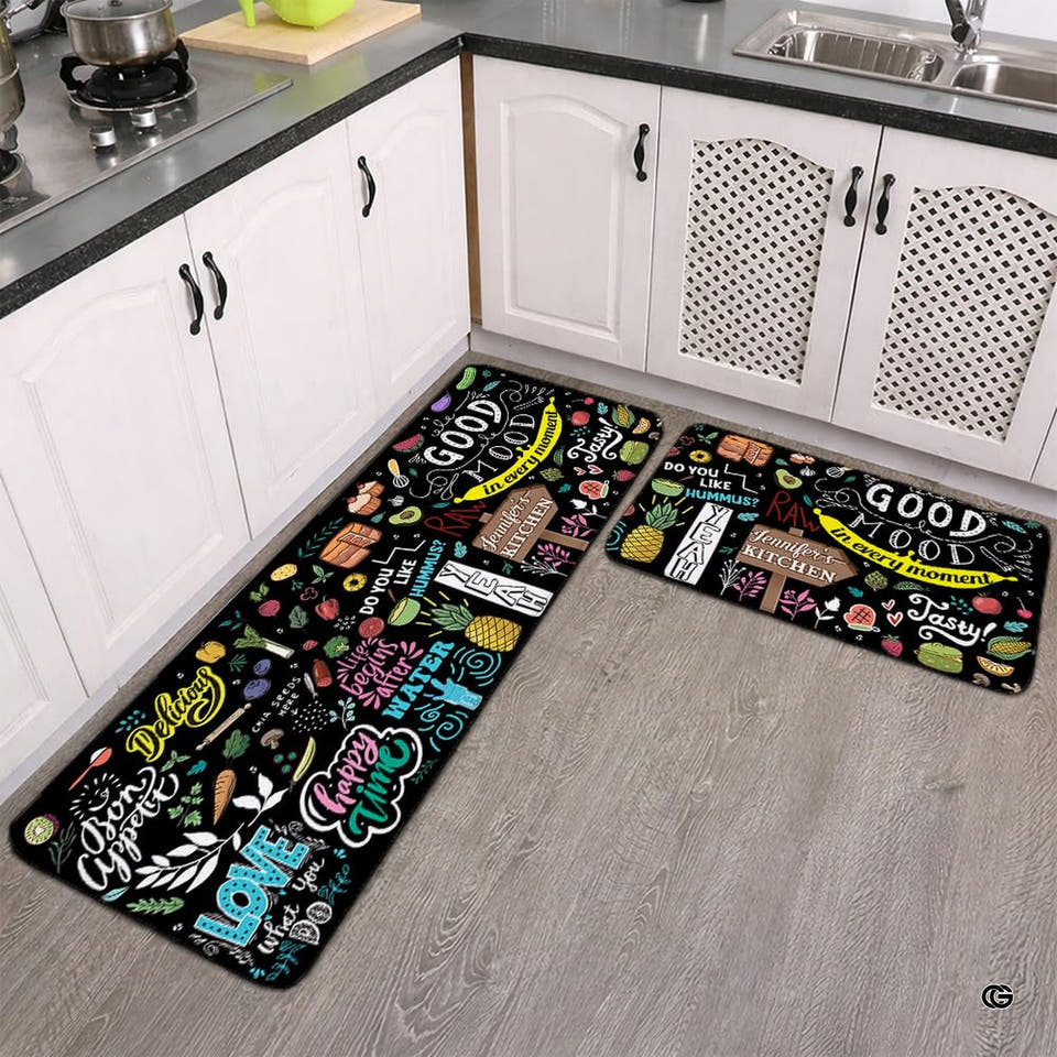 Chalkboard culinary art area rug displayed alongside kitchen cabinets on light wood flooring.