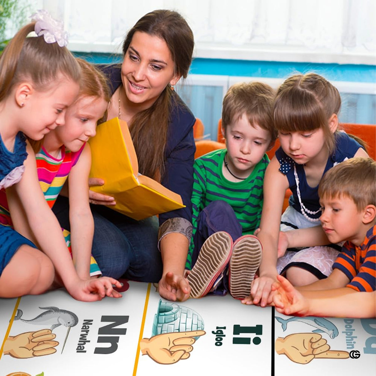 ASL alphabet area rug styled on hardwood flooring in school classroom.