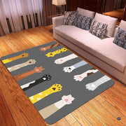 Detailed view of playful kitty paws and pink pads across the cat paw surface area. - thumbnail image 3 of 5