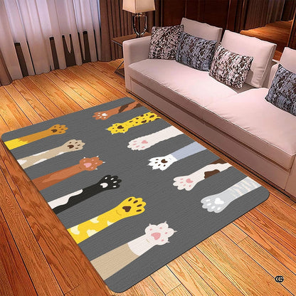 Detailed view of playful kitty paws and pink pads across the cat paw surface area. - thumbnail image 3 of 5