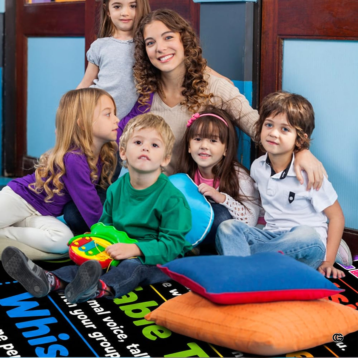 Non-slip grip backing texture and resilient construction of classroom area rug.