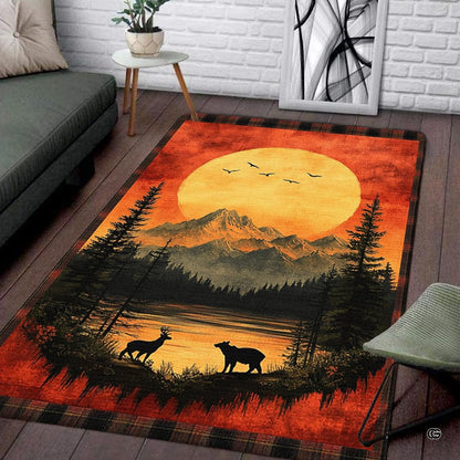 Rustic wildlife mountain landscape area rug featuring bear, deer, lake sunset, and plaid border. - thumbnail image 1 of 5
