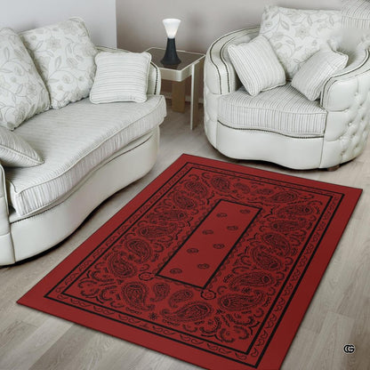 Living room setting styled with a crimson bandana pattern area rug centered beneath modern furniture. - thumbnail image 4 of 9
