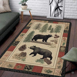 Rustic woodland wildlife area rug featuring two black bears, pine trees, and a decorative patchwork border.