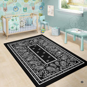 Monochrome bandana pattern rug displayed under natural room lighting. - thumbnail image 6 of 9