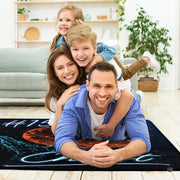 Lifestyle scene featuring family lounging on neon basketball sports area rug. - thumbnail image 5 of 7