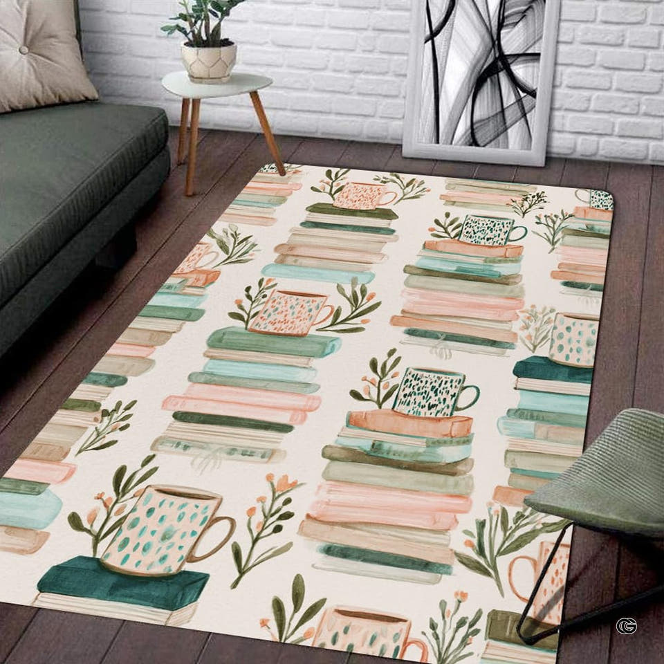 Watercolor stacks of books and teacups area rug laid out on a dark hardwood floor