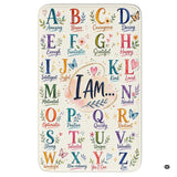 Alphabet affirmation chart with colorful A to Z letters and encouraging words on an educational area rug