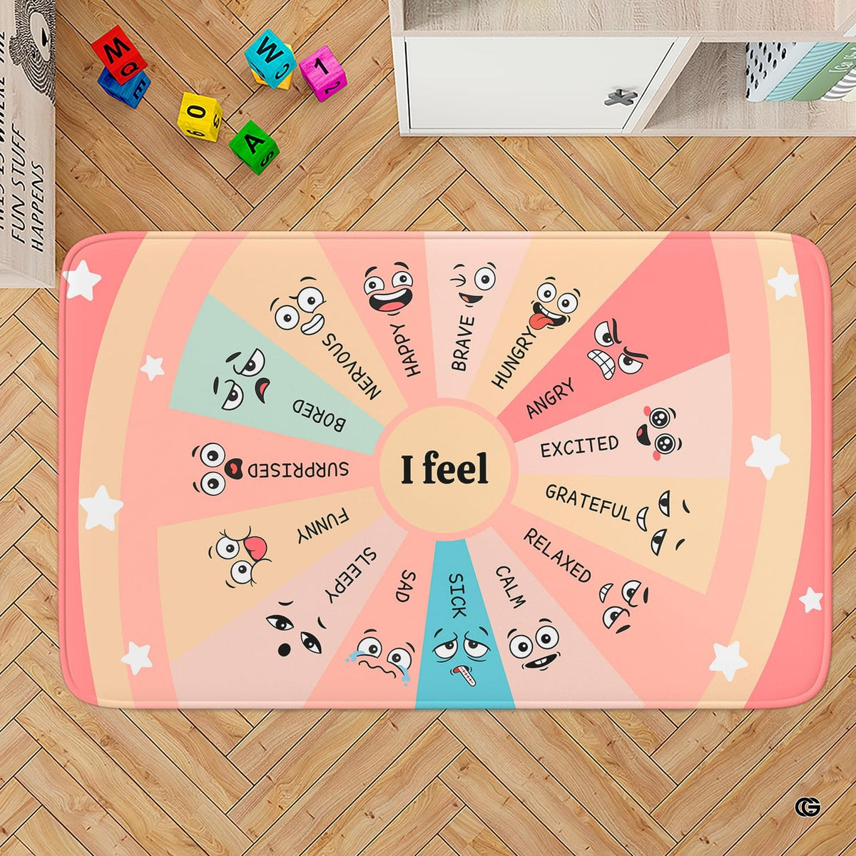 Decorative emotion wheel rug displaying radial color blocks in pink, yellow, and beige.