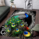 Emerald green peacock area rug featuring royal blue plumage and silver rococo filigree scroll border.