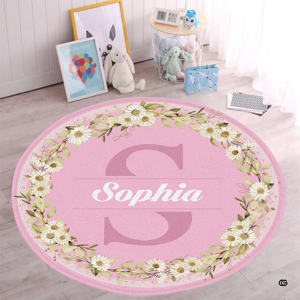 Round pink floral wreath rug in a nursery