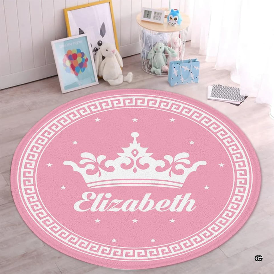 Round pink Greek key crown rug in a nursery