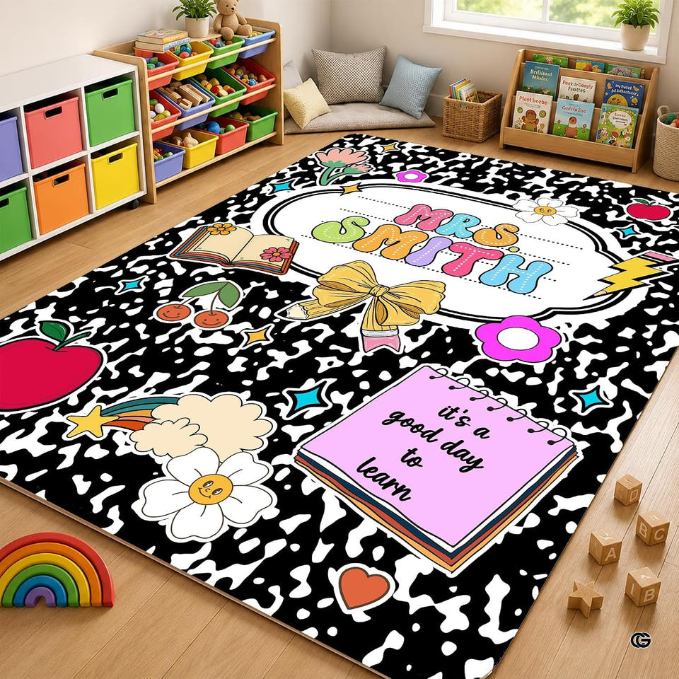 Classroom play corner with toy bins and bookshelves displaying the composition notebook doodle area rug.
