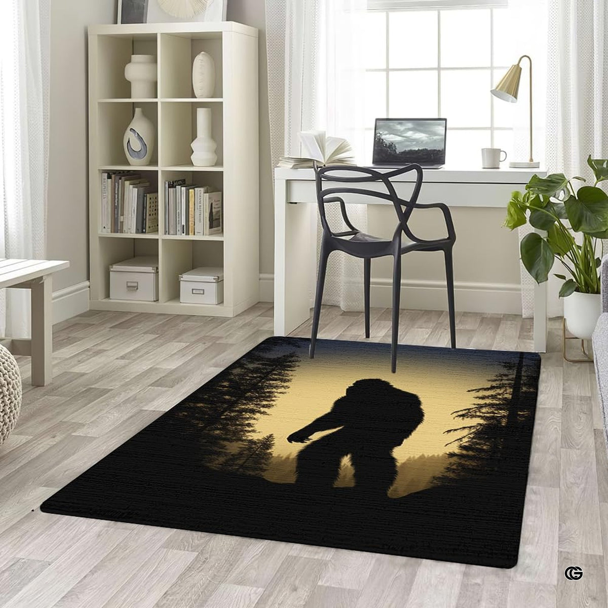 Angled floor perspective of dark evergreen tree and Bigfoot art motif on wilderness area rug. - image 5 of 5