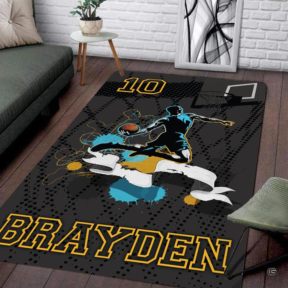 Slam Dunk Basketball Area Rug displaying an airborne player silhouette with vibrant blue and orange paint splatters.