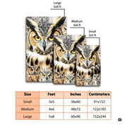Close-up detail of realistic horned owl facial discs and patterned feather artwork on a graphic area rug. - thumbnail image 2 of 8