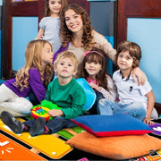 Side angle view of the dark chalkboard style floor rug with bright xylophone graphic. - thumbnail image 6 of 7
