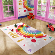 Angle view highlighting multi-stripe arch graphics and floating heart motifs on an artistic area rug. - thumbnail image 4 of 7