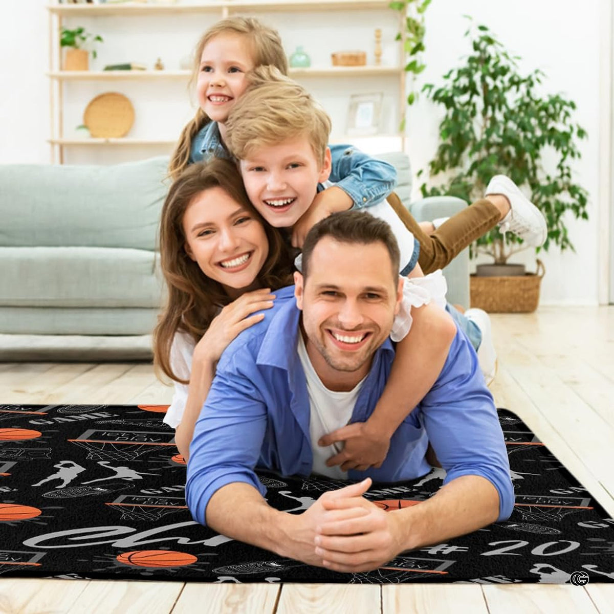 Close-up perspective of basketball hoops, nets, and splatter graphics on a black sports theme area rug. - image 5 of 7
