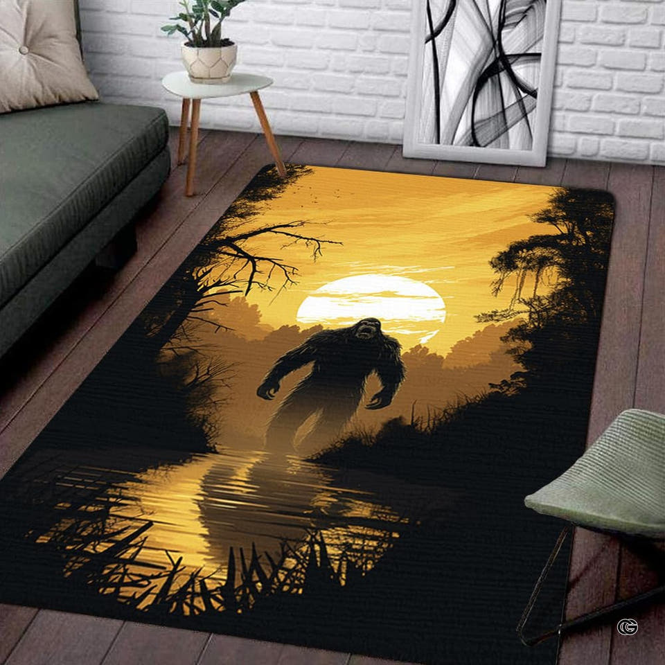 Bigfoot silhouette walking across river under amber moon area rug.