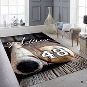 Baseball athletic area rug showcased in a vintage game room setting alongside rustic timber decor elements. - thumbnail image 6 of 8