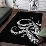 Monochrome black and white octopus tentacles illustration rectangular area rug.