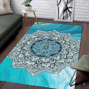 Side angle shot highlighting rich turquoise and ocean blue fluid art details on circular floor rug - thumbnail image 7 of 8