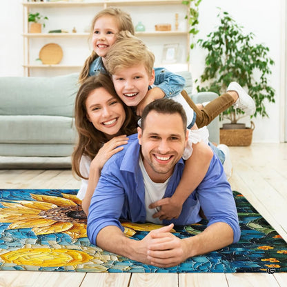 Lifestyle living room scene featuring family lounging on mosaic sunflower area rug. - thumbnail image 5 of 8