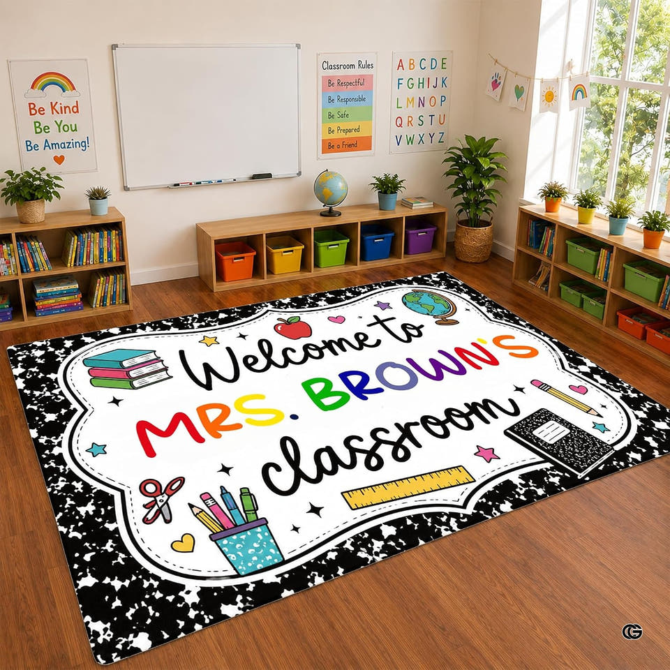 Blue coastal classroom area rug showcasing bright pastel geometric blocks and cheerful rainbow doodles on cream.