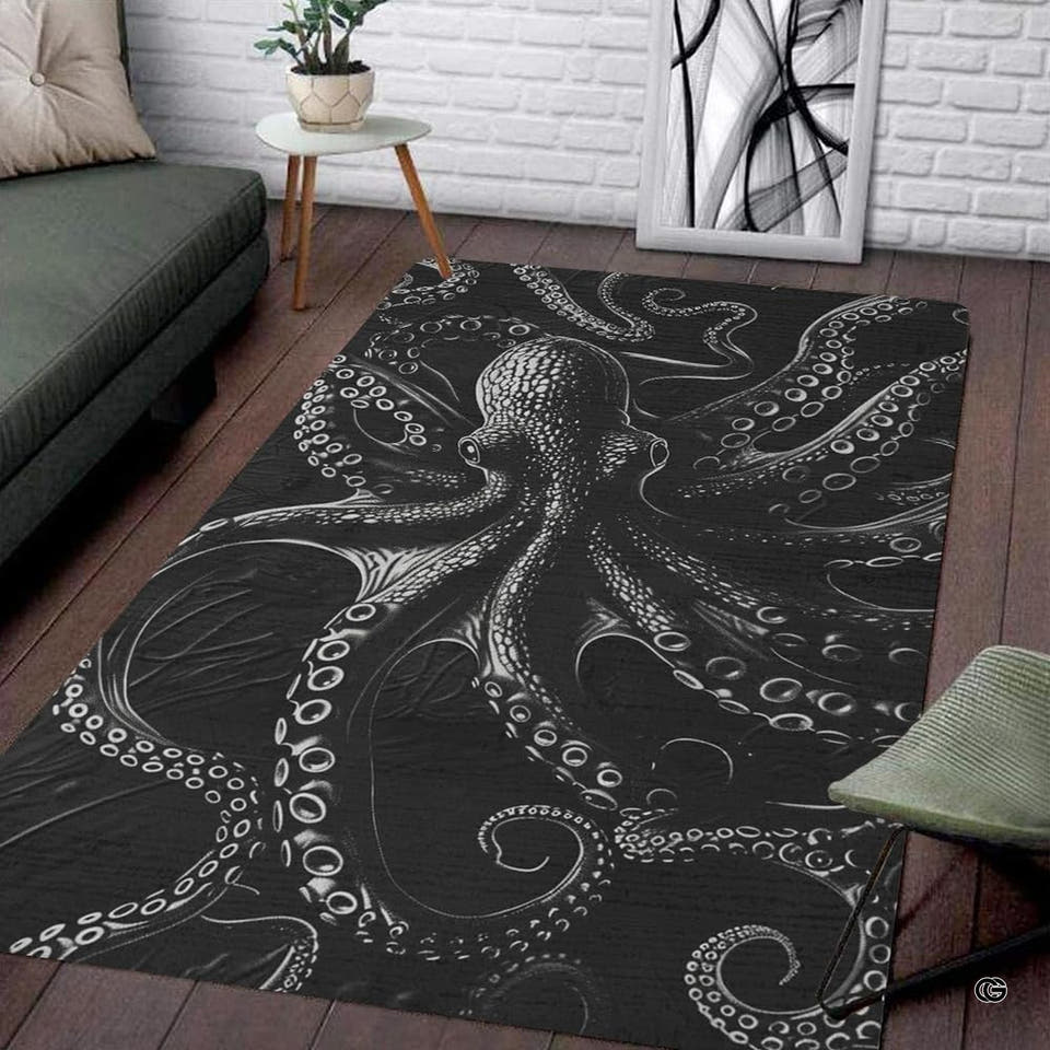 Living room corner view showing the rectangular black and white octopus area rug on dark wood floor.