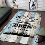 Rustic wood area rug featuring mallard decorative accent artwork, crossed shotguns, and blue weathered timber planks in a... - thumbnail image 1 of 6