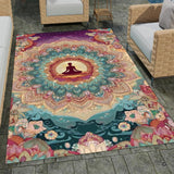 Patio stone lounge with wicker seating displaying the meditating yoga mandala area rug