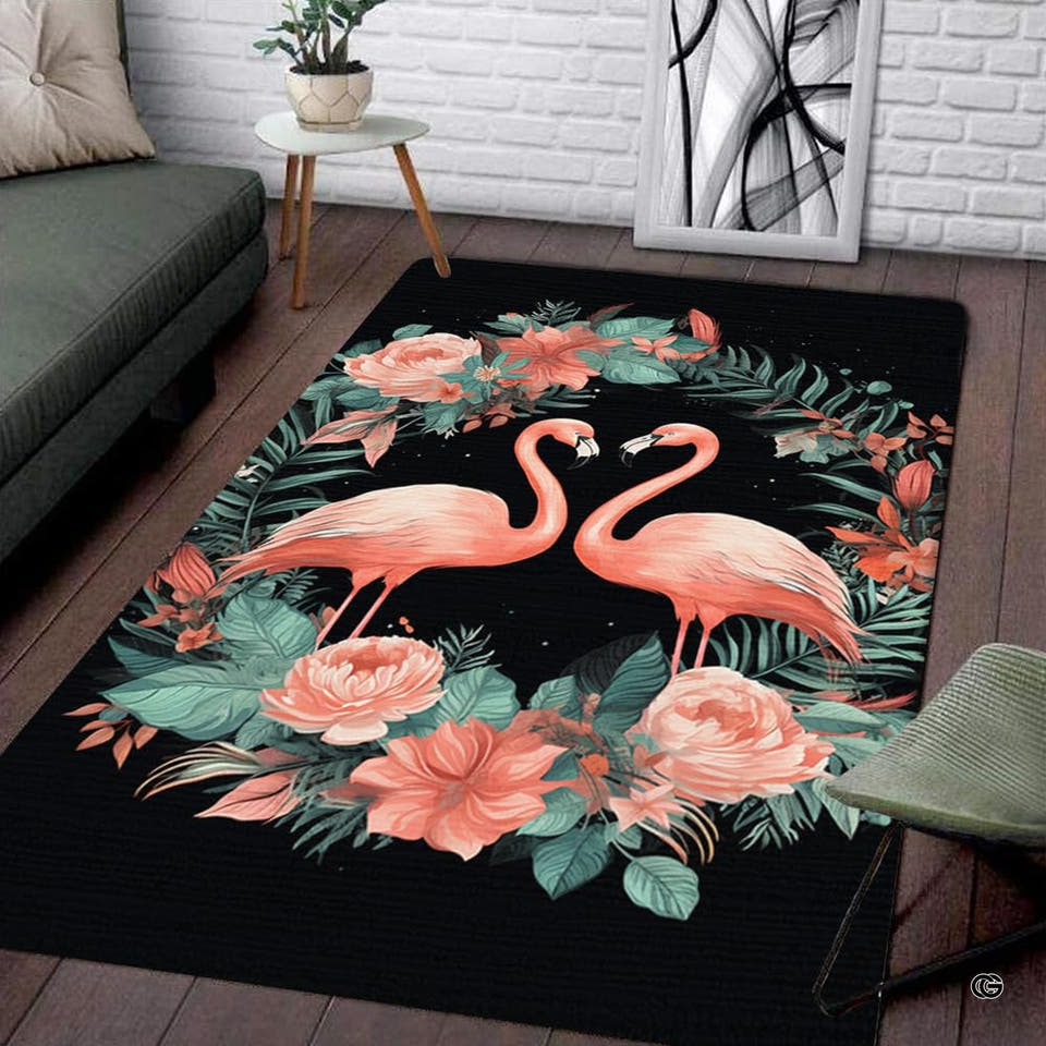 Rectangular floor area rug featuring twin pink flamingos inside botanical peony wreath on black base