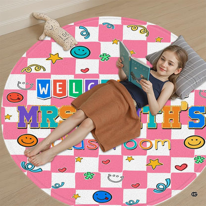 Detailed angle of check round rug highlighting pastel check squares and colorful banner accents. - thumbnail image 5 of 7