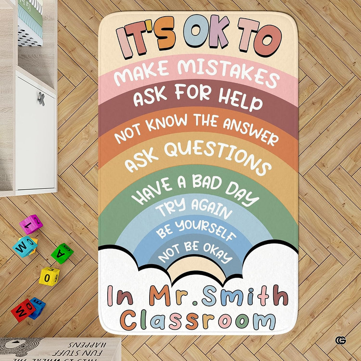 Top-down floor view showing the arched rainbow affirmations area rug on hardwood