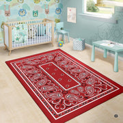 High-contrast white teardrop boteh motifs and intricate framing on crimson floor decor. - thumbnail image 6 of 9