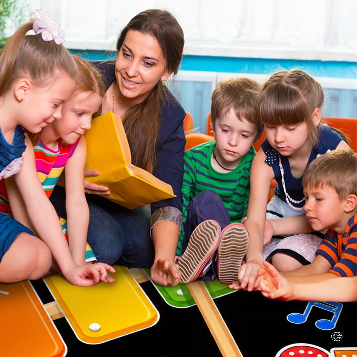 Decorative floor accent showcasing colorful percussion art in an organized learning zone. - image 5 of 7