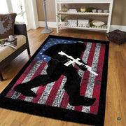 Bigfoot American flag rug 5x8ft area rug displayed in a cozy living room setting. - thumbnail image 1 of 5