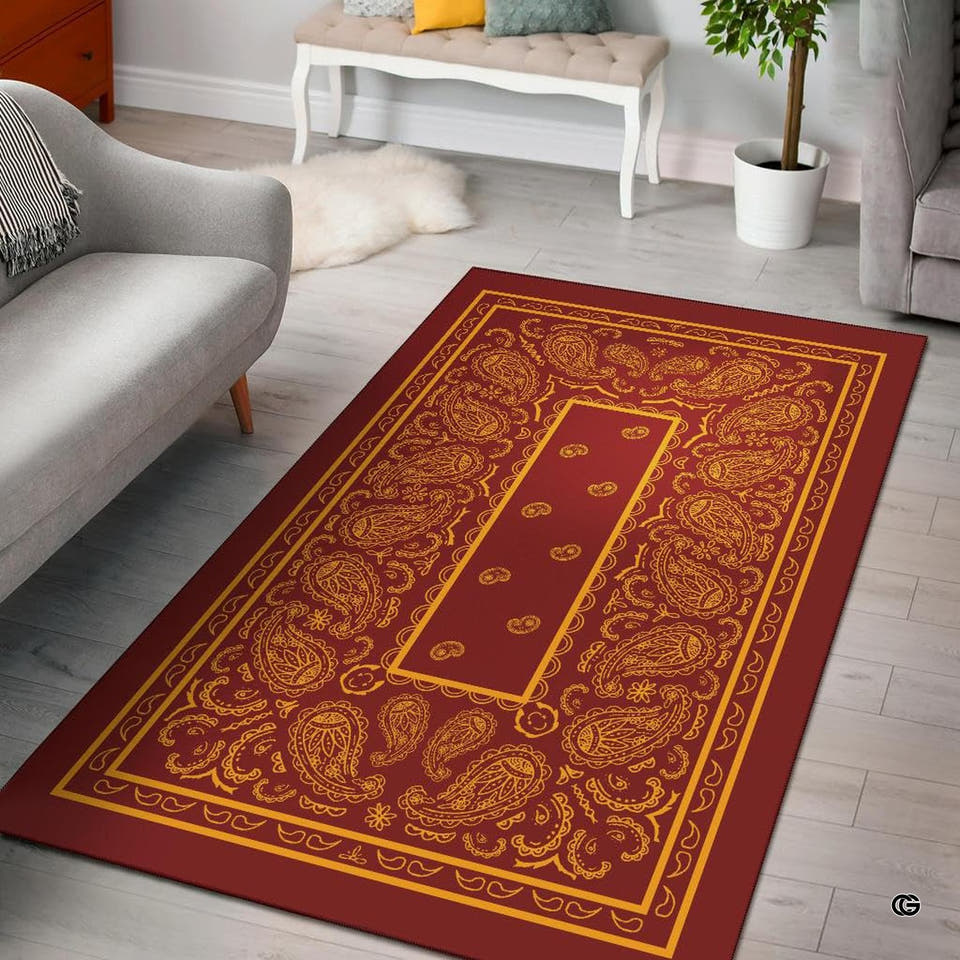 Burgundy maroon and gold yellow bandana paisley print living room area rug with ornate borders